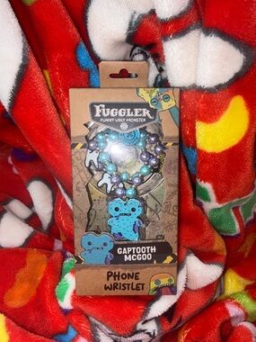 Fuggler Gaptooth McGoo Blue Purple Phone Wristlet beaded chain NEW QUICK SHIP